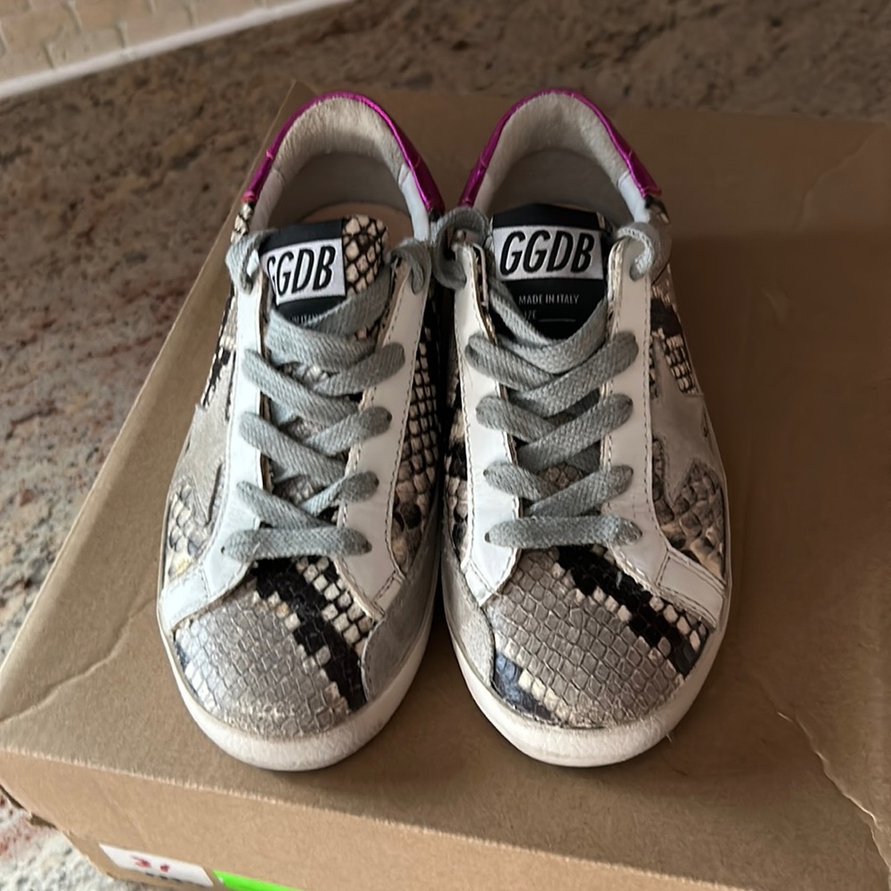 Selling brand new golden goose never worn. Don’t have a box